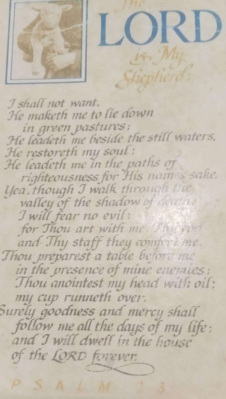 My mother’s yellow card, which now lives in my daily prayer book.